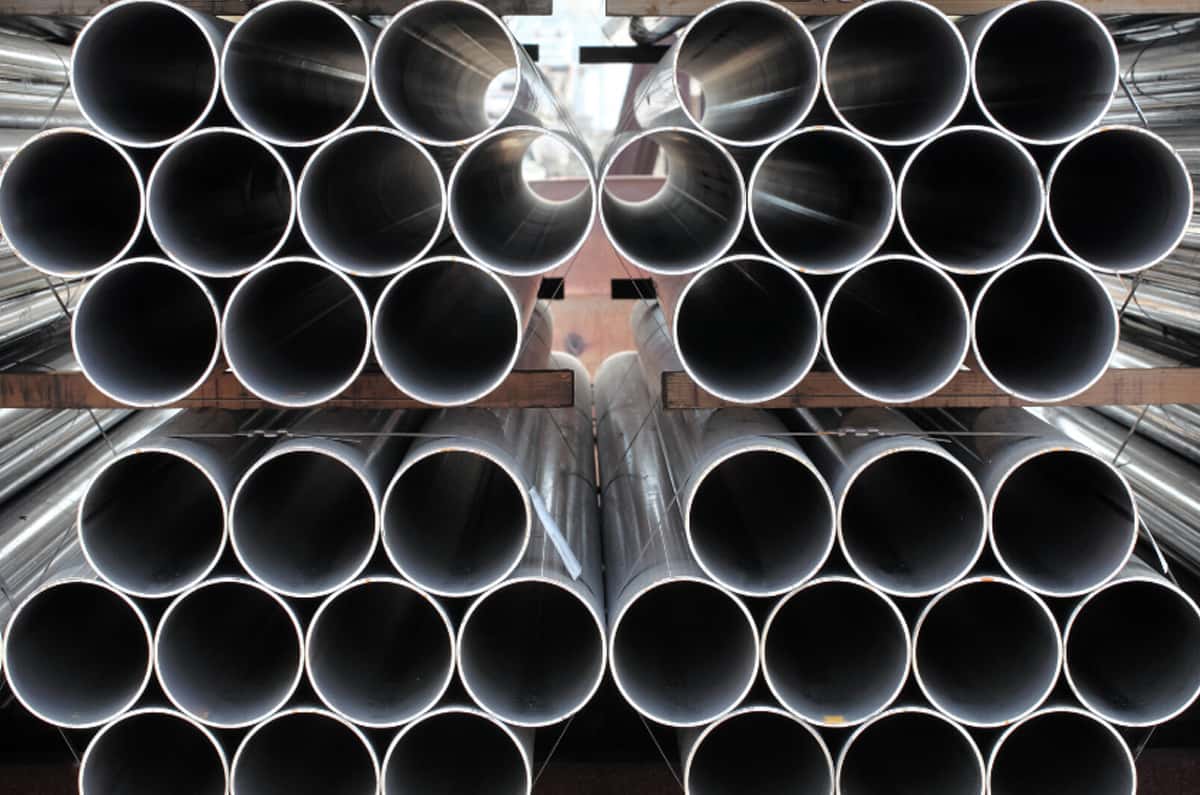 Stacked carbon steel pipe ends in inventory