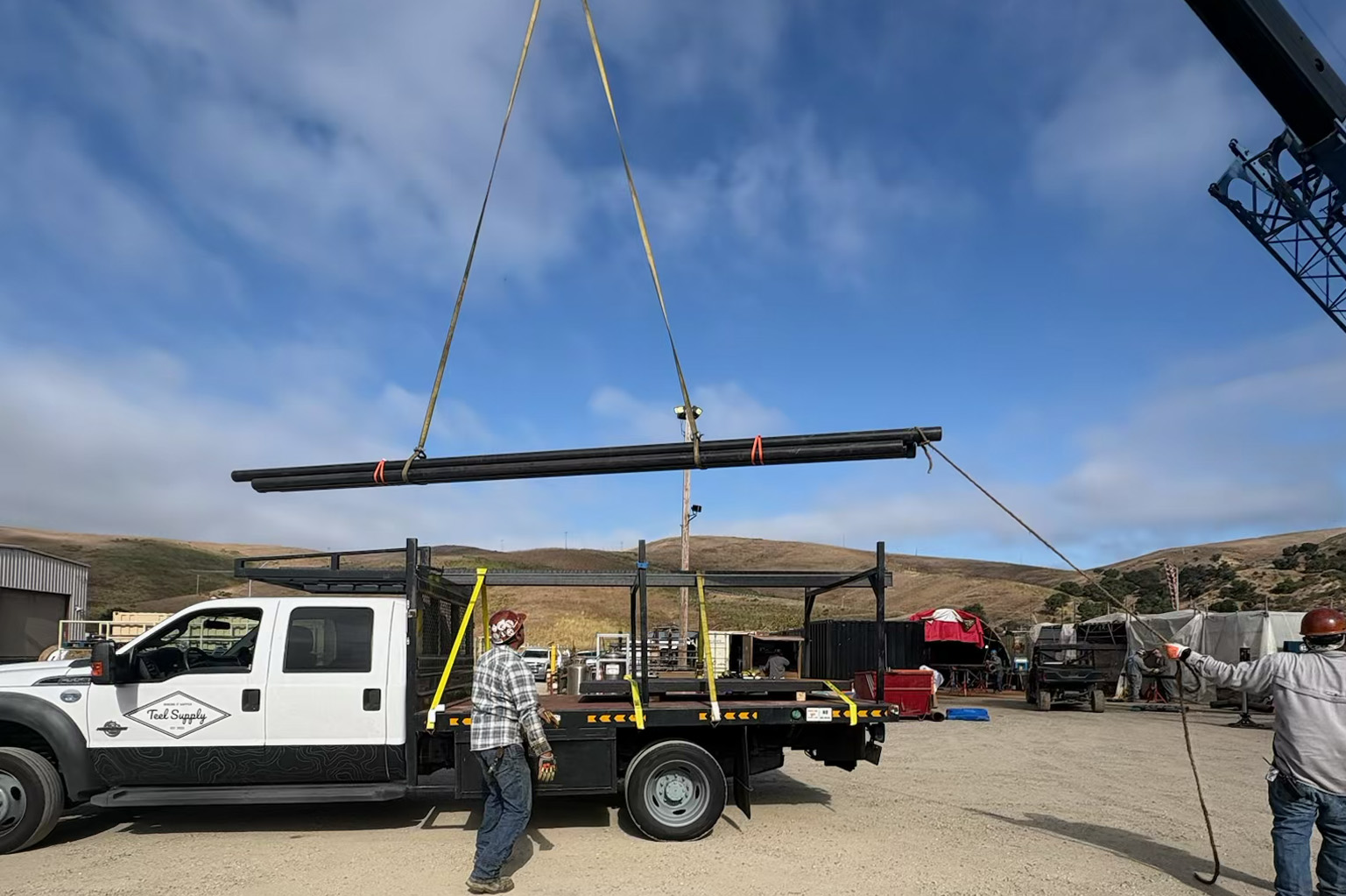 Teel Supply team reviewing specifications